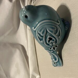Beautiful, porcelain with cut out details hand made n painted “ Blue Bird of